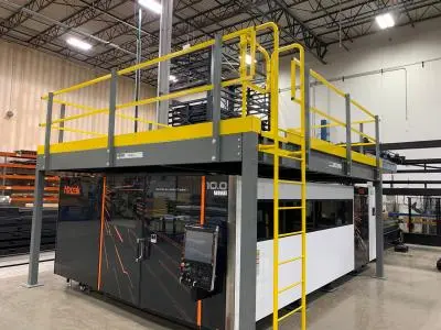 A mezzanine atop an in-plant office built inside of a warehouse.