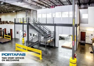 An in-plant office built on a two-story mezzanine in a warehouse.