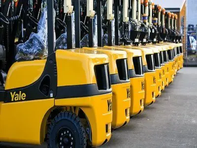 A fleet of Yale electric forklifts.